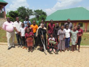 Group photo with Hon. Safia Nalule of the Equal Opportunities Commission